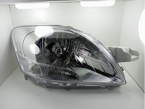 Faro Derecho Toyota Yaris Belta 09-10