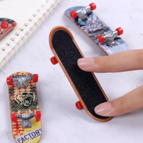 Compra online de Plástico mini dedo patinação tabuleiro de jogo brinquedo  crianças liga skate dedo skate fingerboard scooter skate