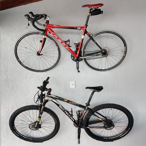Imagem 8 de 10 de 2 Suportes Para Pendurar 2 Bicicletas Na Parede Com Trilhos P Troca Entre Modelos Mtb Speed + Furo Pra Tranca E Gabarito