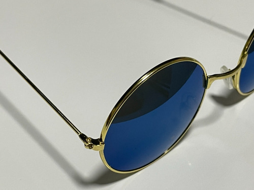 Gafas de sol redondas Motorhomestore con lente azul espejo y armazón dorado
