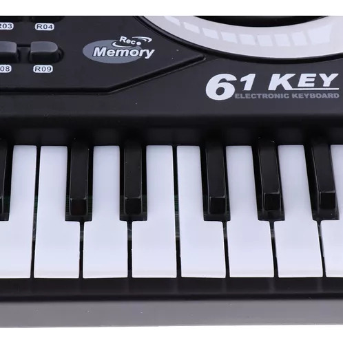 Teclado De Piano Digital Con Micrófono Instrumentos 61teclas Color Negro