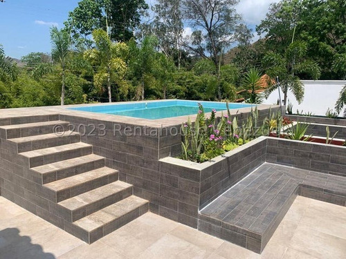 Exclusiva Casa Remodelada Con Piscina, Sauna, Area De Jardin, Estacionamiento 12 Vehiculos Casilla Vigilancia A Estrenar Concepto Moderno Exclusiva Zona Privada Palmarito Estef 24-15119