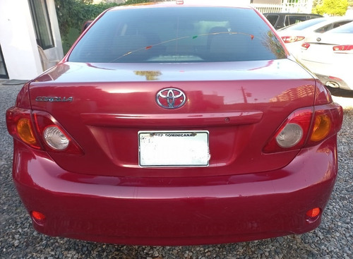 Imagen 2 de 9 de Toyota Corolla 2009 Rojo Metalico Impecable