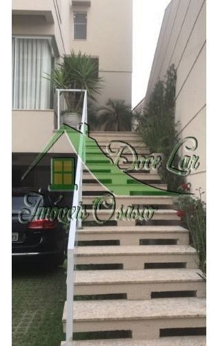 Imagem 2 de 15 de Lindo Sobrado Com 4 Suítes E 5 Vagas De Garagem. Ótima Localização.