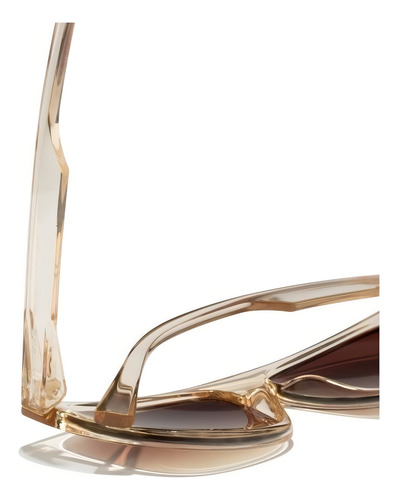 Anteojos de sol Hawkers Lifestyle Runway diseño Champagne armazón champagne transparente y lente marrón