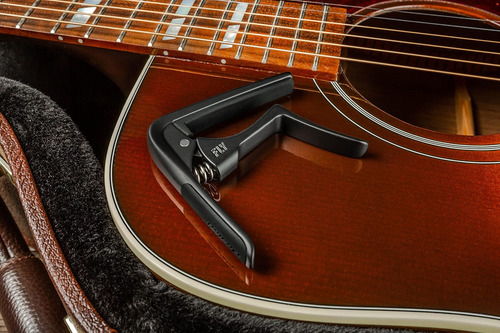 Cejilla Jim Dunlop Trigger Fly Curva Negra
