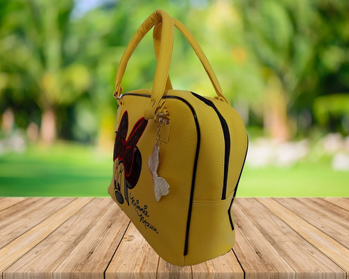 Imagen 2 de 8 de Bolsa De Dama, De Disney, Minnie Mouse En Color Amarillo.