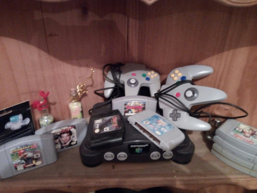 Nintendo 64 Con Dos Controles Y 9 Cassetes Y Memoria 