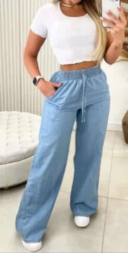 Calça hotsell soltinha jeans