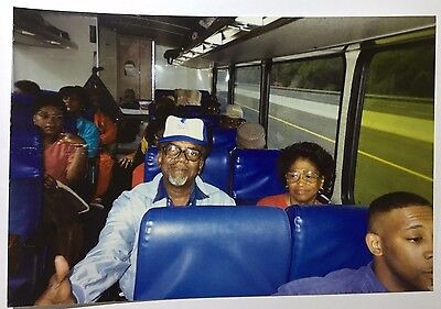 Vintage Photo Man In Trucker Hat And Glasses In Tour Bus Lql