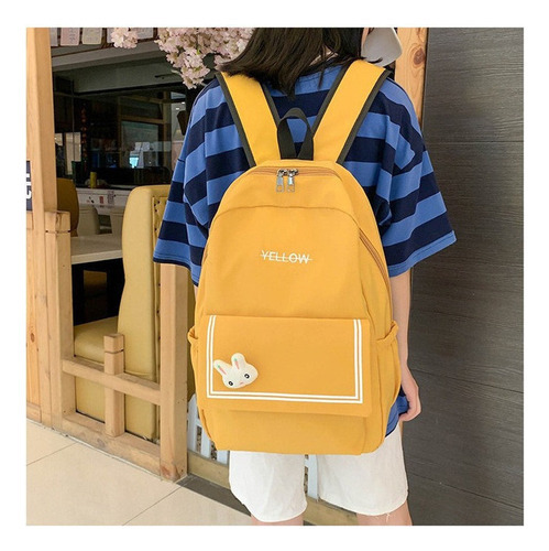 Mochila casual impermeable para mujer con adorno de color amarillo, diseño de tela lisa