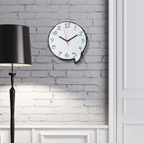 El reloj de pared con forma de globo con forma de cómic de Hq Comics habla de cómics