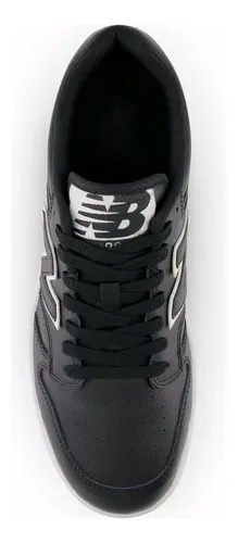 New balance hombre negras hd hot sale