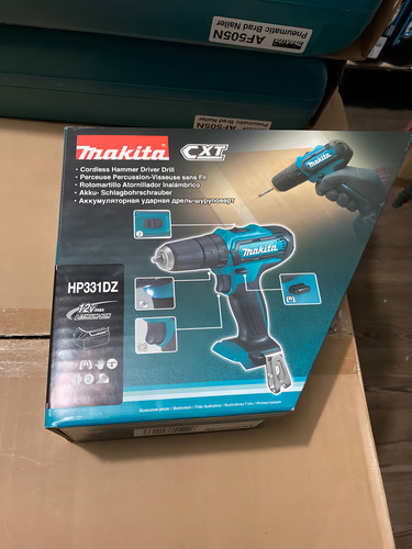 Taladro percutor atornillador inalámbrico de 10mm Makita Hp331dz 12V + accesorio con caja de cartón 220V