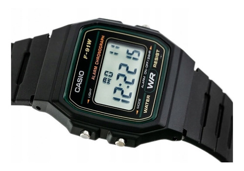 Imagen 2 de 2 de Reloj de pulsera Casio Collection F-91 de cuerpo color negro, digital, fondo gris, con correa de resina color negro, dial negro, minutero/segundero negro, bisel color verde y hebilla simple