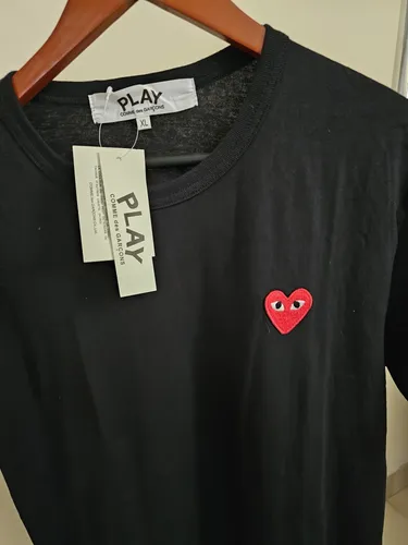 Comme des garçons playera negra hotsell