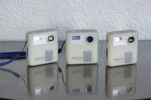 Camara Digital Polaroid Izone 550 5mp+mp3 3unidades