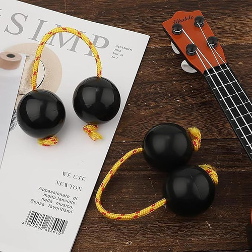 Instrumentos Rítmicos De Percusión De Bolas Con Una Sola Man