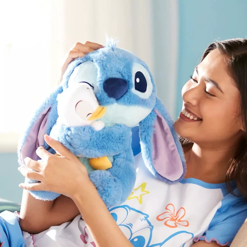 .. Lindo Peluche De Stitch Abrazando A Un Pequeño Pato Lilo