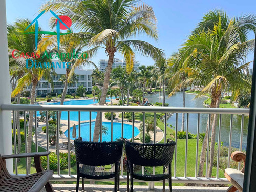 Cad Mayan Lakes 16 302. Amplia Terraza Con Vista A Las Áreas Comunes Y Acceso A Un Exclusivo Club De Playa