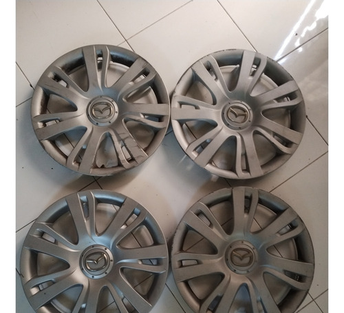 4 Tapónes De Rin Mazda 2 Originales Rin 15 (Usado)