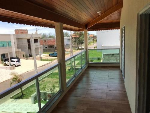 Imagem 3 de 14 de Casa Com Piscina Em Condomínio De Frente Pro Mar Em Itanhaém