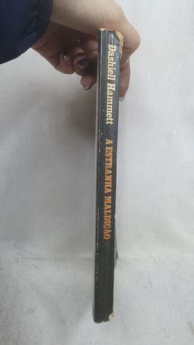 Livro A Estranha Maldição - Dashiell Hammett - Editora Abril Cultural / Brasiliense (Usado)