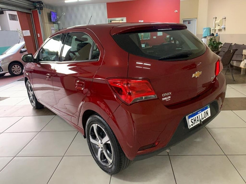 Imagem 4 de 12 de Chevrolet Onix 1.4 Ltz 5p 2018/2019 Vermelho