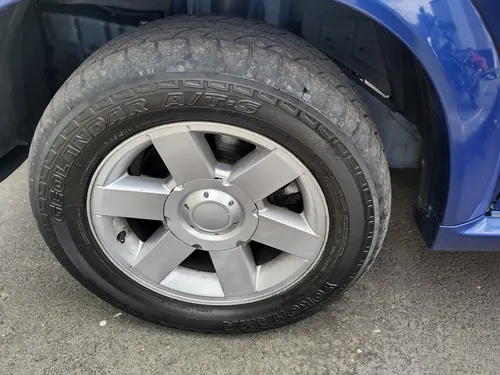 Es Una Camioneta 7 Puestos Con Un Motor V6