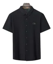Comprar Playera Burberry De Color Negro Con Café Para Hombre