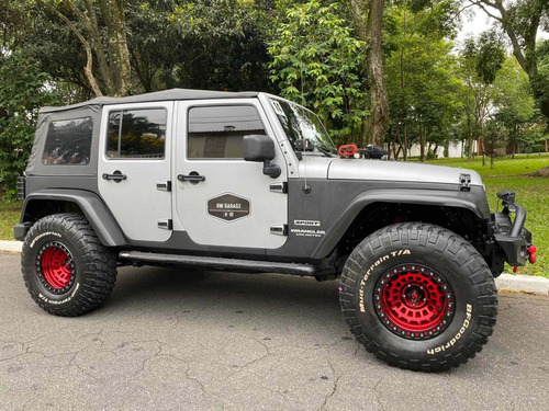 Jeep Wrangler 3.6 Unlimited Sport Aut. 4p 2013 Equipado Top