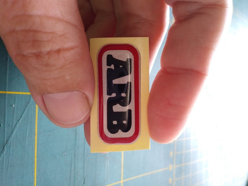 Imagen 2 de 5 de Emblema Arb Para Faro Reflectivo Con Pega Extrafuerte