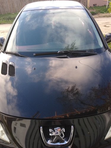 Imagem 4 de 9 de Peugeot 207 Passion 2011 1.4 Xr Sport Flex 4p
