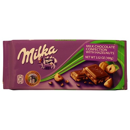 Confección De Chocolate Milka Con Leche Con Las Avellanas