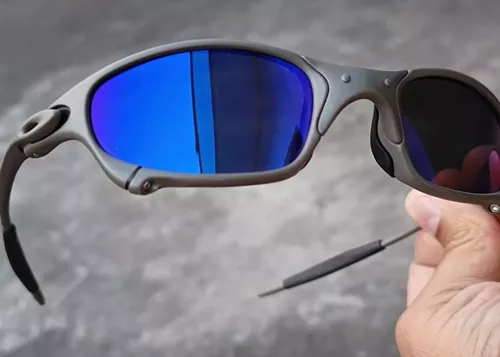 ÓCULOS DE SOL OAKLEY JULIET - LENTE AZUL DARK BLUE ARMAÇÃO CINZA