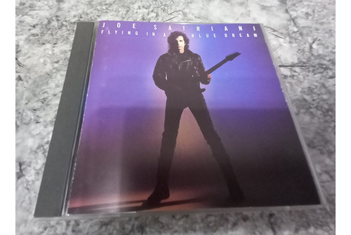 Joe Satriani : Flying In A Blue Dream (cd-imp) 1989 Descat 
