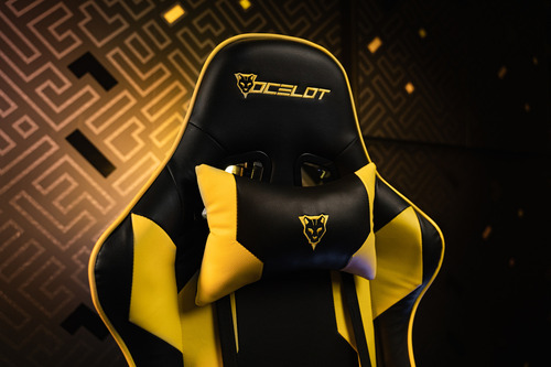 Silla Gamer Ergonómica Reclinable Ocelot Gaming OGS-02 de piel sintetica negra con amarillo brazos 2D piston clase 4 soporta hasta 150 kg con cojin lumbar y cervical