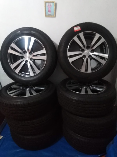 Imagen 1 de 2 de Llanta + Aro Bridgestone 245/60r18 Radial