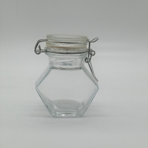 Imagen 1 de 3 de Frasco De Vidrio Hexagonal Con Tapa De Clip 8,3x4,5 Cm