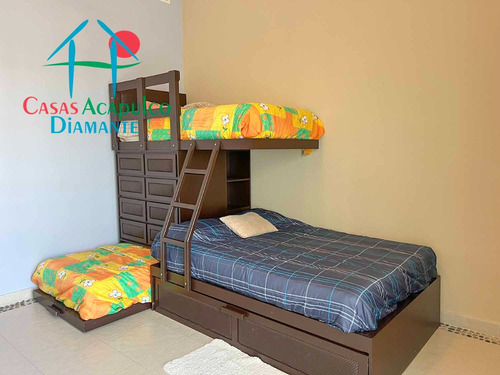 Cad Mayan Lakes 16 302. Amplia Terraza Con Vista A Las Áreas Comunes Y Acceso A Un Exclusivo Club De Playa