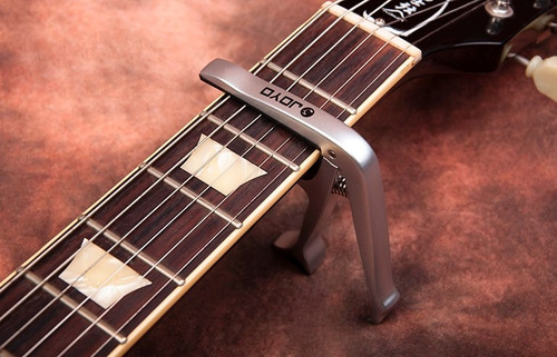 Imagen 6 de 7 de Requinto Capo Para Guitarra Joyo Con Destapador Y Saca Pines