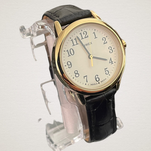 Reloj Mujer Timex Correa De Piel Luz Indiglo Tw2r633009j Correa Negro Bisel Dorado Fondo Blanco