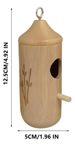 Un Comedero Decorativo Para Pájaros Con Forma De Casa De Col
