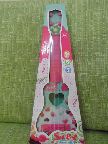 Imagen 1 de 1 de Guitarra De Juguete