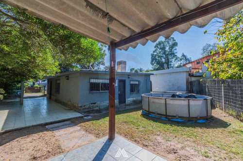 Venta Casa 2 Dormitorios Los Titanes Con Cochera