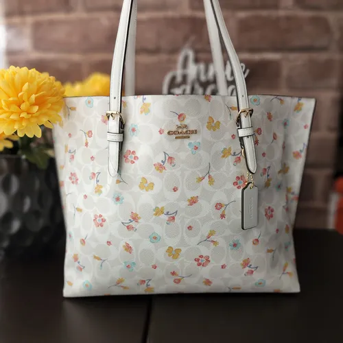 Bolsa coach con flores hotsell