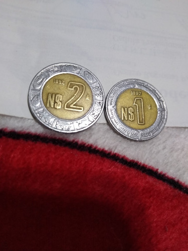 Monedas De 1 Y 2 Pesos Con Error En Fecha De Acuñación 