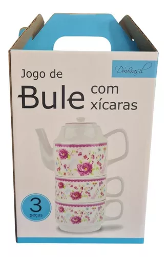 Jogo de chá com bule e bule com flor.