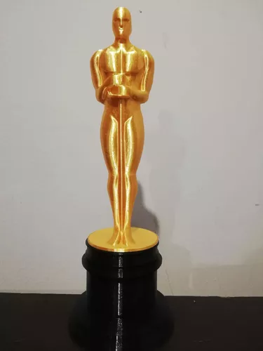 Premio trofeo de estatuilla estilo Oscar figura de latón sólido sosteniendo  corona de laurel sobre base de madera 7 de altura en 3.5 x 3.25 base -   México