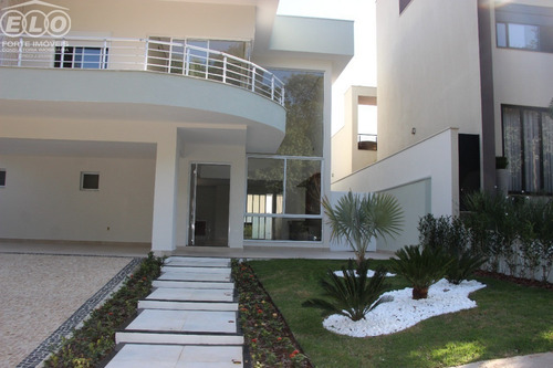 Imagem 2 de 25 de Lindo Sobrado Com Projeto Moderno, Em Condomínio Fechado, Bem Localizado De Frente Para Mata, 4 Suítes, Com Lazer Para Toda Família, - Ca05419 - 69353533